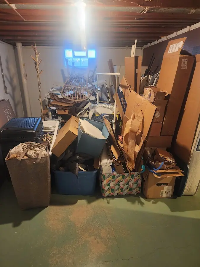 Roll-off dumpster container at job site for 15 Yard Dumpster Rental in Geneva